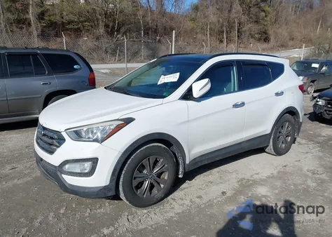 2014 Hyundai Santa Fe Sport 2.4L z USA, uszkodzony, nr VIN 5XYZUDLB7EG227607